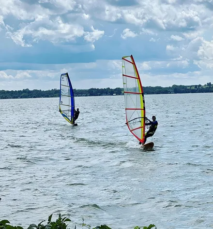 Ian McDougall windsurfing on Lake Scugog